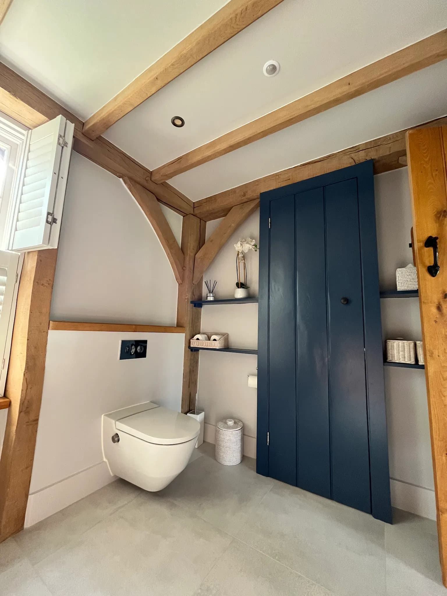 Tiled bathroom with freestanding bath